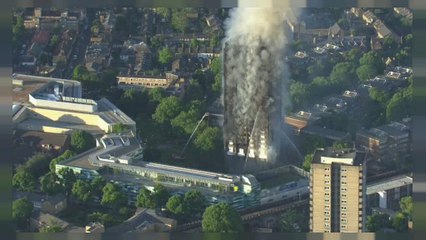 May bows to public pressure over Grenfell