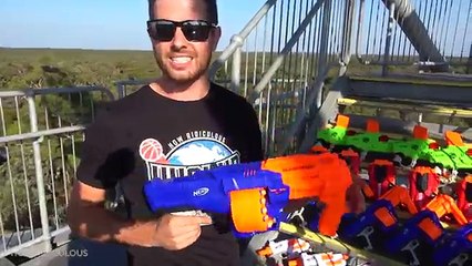 GIANT WATER BOMB Vs. NERF BLASTERS!