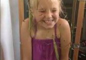 Fearless Little Girl Giggles While Covered in Stick Insects