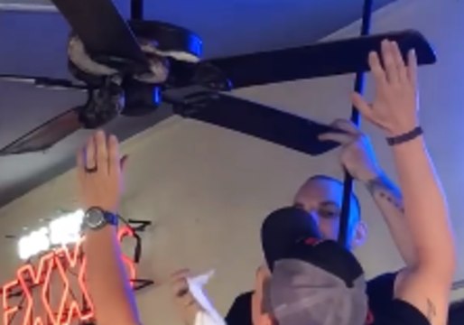 Diners Shriek Hysterically as Waco Bar Staff Remove Snake From Ceiling Fan