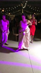 Dancing Bridesmaid Captivates Crowd
