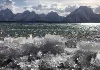 Melting Ice Creates Sparkling Waves on Jackson Lake, Wyoming