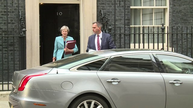 Theresa May departs Downing Street ahead of PMQs