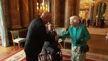 The Queen meets war heroes at Buckingham Palace