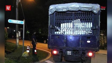 Police cars, truck at Najib’s house
