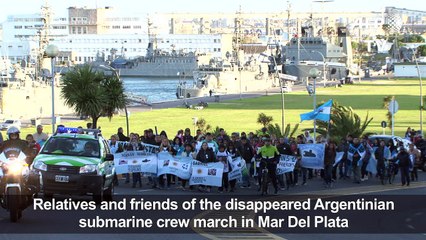 Silent march six months after disappearance of submarine