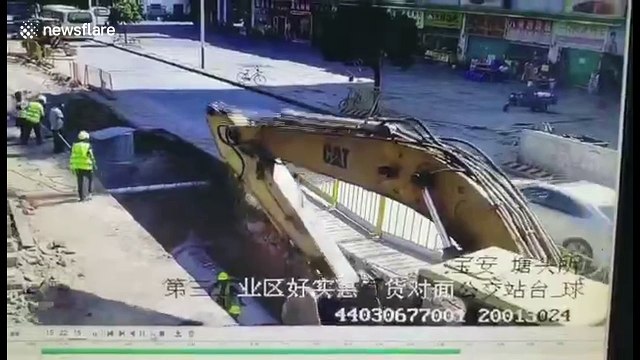 2 workmen buried under rubble as road collapses