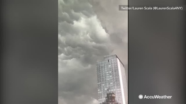 Violent wind blows water out of rooftop swimming pool in Manhattan