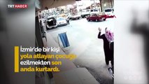 Kendi canını tehlikeye attı, kız çocuğunu ezilmekten kurtardı