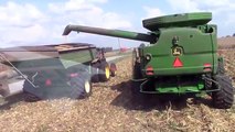 Four John Deere S670 Combines Harvesting Corn