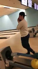Guy Throws Bowling Ball And Falls Into The Other Lane