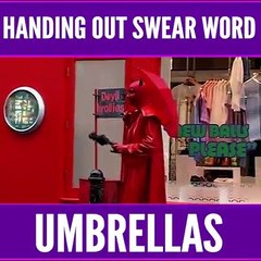 Handing out swear word Umbrellas