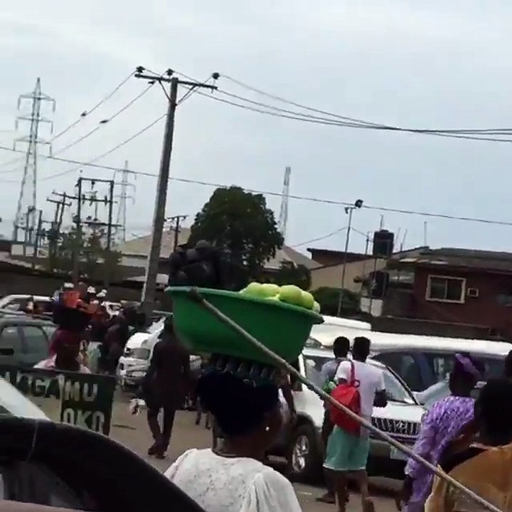 Happening Now!!!! Simple man climbs high tension wire without safety