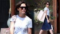 Katie Holmes dons a denim A-line skirt with ballet flats to shop at Ulla Johnson boutique in New York City