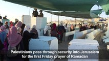 Palestinians cross checkpoint to pray at Al-Aqsa mosque