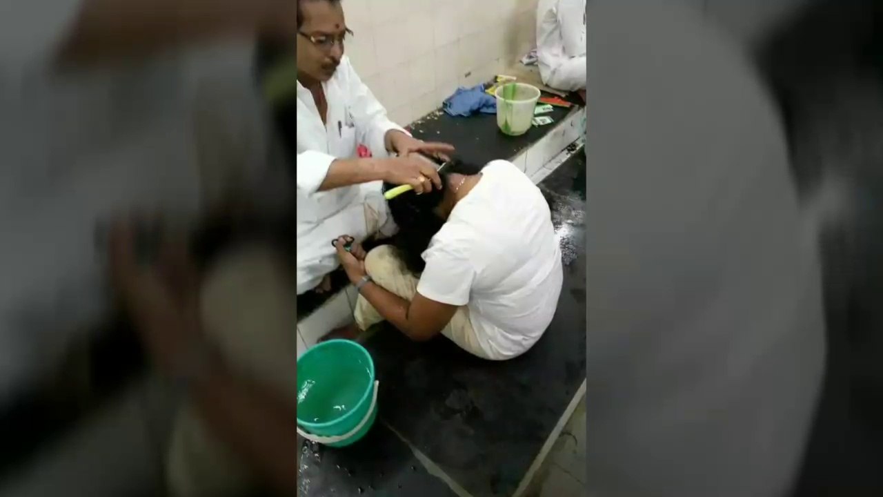 Young lady thick hair shave in tirumala back view