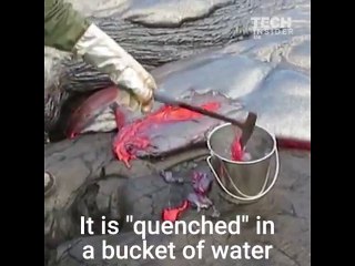 Geologist scoops molten lava to get tested