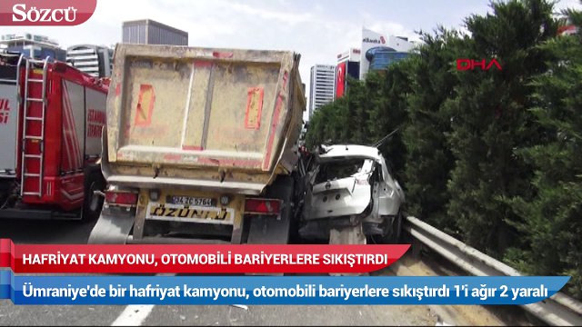 Hafriyat kamyonu otomobili bariyere sıkıştırdı