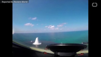 China's Air Force Conducts Military Exercises In Contested South China Sea