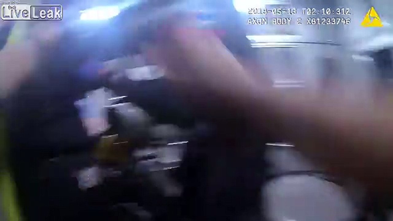 Body cam video shows EMT hitting patient in ambulance