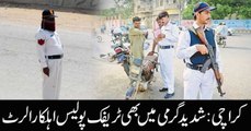 Traffic police personnel performing duties in steaming hot weather