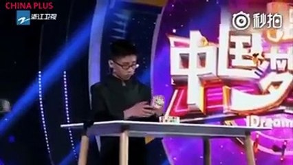 Can this boy from China solve 3 different Rubik's Cubes while juggling them in the air at the same time in under 6 minutes in order to set a Guinness World Reco