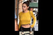 Selena Gomez New Street fashion & Sleek Selena accessorized her look with yellow lens sunglasses