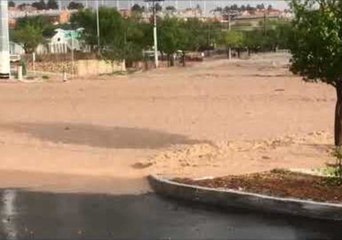 Flash Floods Turn Road Into River in Mesa Hills
