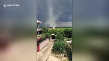 Tornado sends debris spinning into the sky in southern China