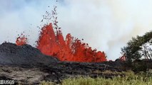 Lava splatters from fissures in Kilauea volcano in Hawaii