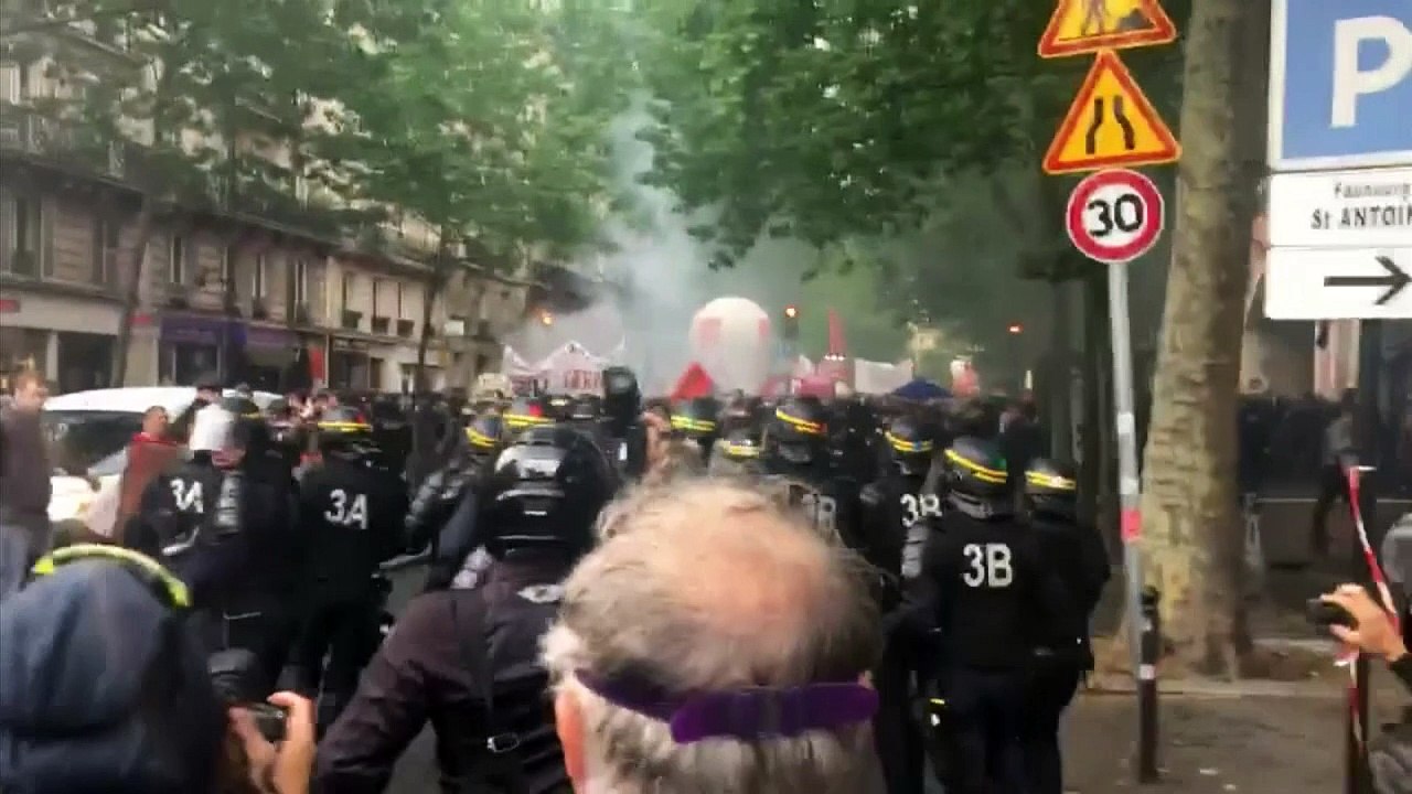 French public service workers clash with police