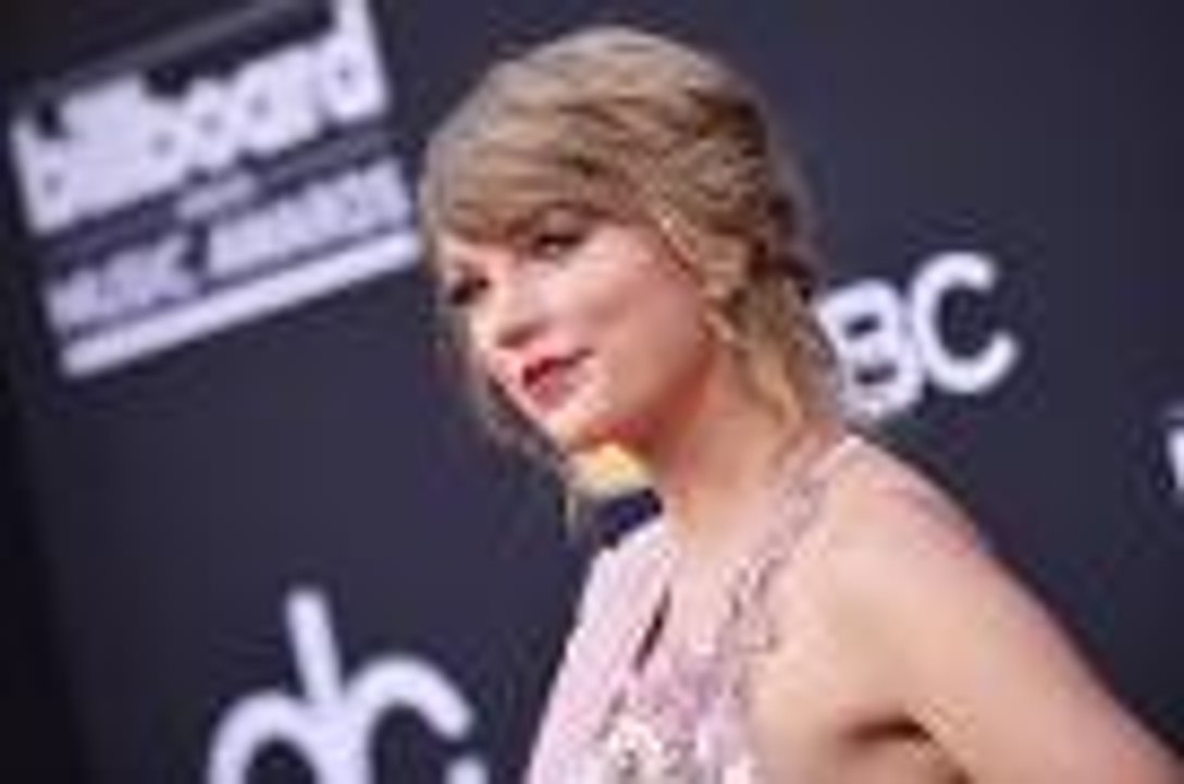 Taylor Swift Reacts to Her Cats Olivia & Meredith Being Featured in 'Deadpool 2' | Billboard News