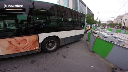Cyclist comes up with unorthodox way to beat insane Paris traffic jam