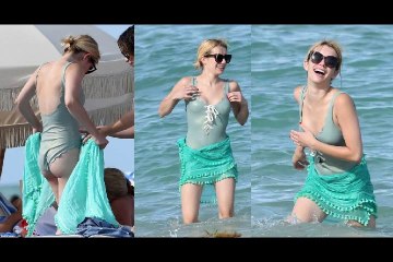 Emma Roberts wearing a swimsuit at the miami beach