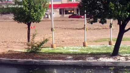 Floodwaters rage through street after heavy storm hits El Paso, Texas