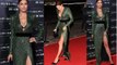 Irina Shayk stuns in plunging emerald green gown slashed daringly high on the thigh as she attends Opera on Ice show in Italy