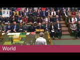 Theresa May defends air strikes against Syria