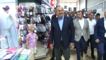 Bakan Çavuşoğlu'ndan esnaf ziyareti