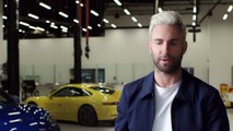 Adam Levine drives the Mission E at the Porsche Experience Center Los Angeles.