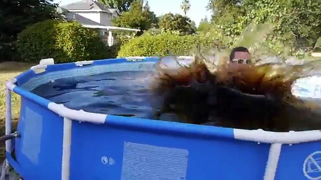 Taking a Bath in a Giant 1,500 Gallon Coca-Cola Swimming Pool!
