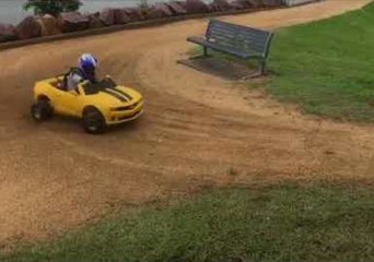 Little Boy Cruises Around in a Mini Camaro