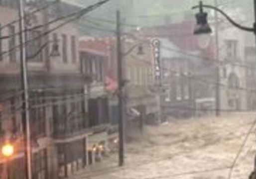 Floodwaters Rage Through Maryland Street as State of Emergency Declared