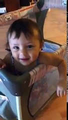 Angie trying to take off her diaper