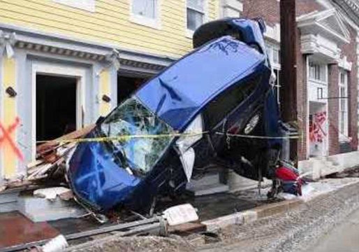 Wrecked Cars, Mud and Debris Clog Ellicott City's Main Street Following Devastating Flash Floods