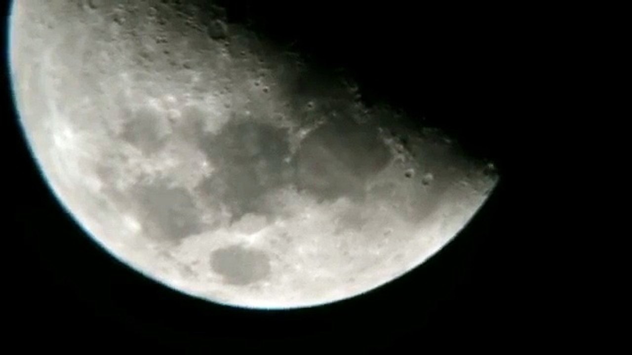 UFOs Passing Over the Moon