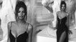 Emily Ratajkowski bares her cleavage in plunging evening gown as she shares throwback from Paris