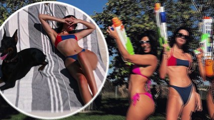 Kendall Jenner and sister Kourtney don skimpy bikinis as they hang out poolside on Memorial Day