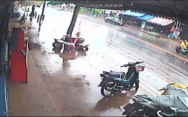 Car Sliding into Tree Captured on CCTV