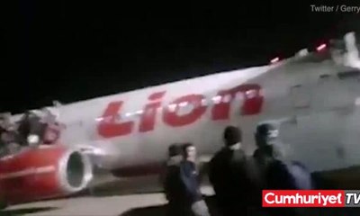 Yolcular uçağında kanadından atladı