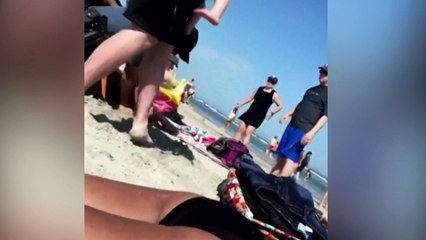 Police resign after footage shows him punching woman